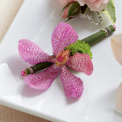 Pink Mokara Boutonniere – ANITA'S FLOWERS AND ICE CREAM LLC, Passaic NJ